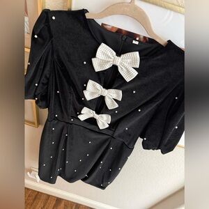 Elegant Black Dress with Pearl Bow Accents